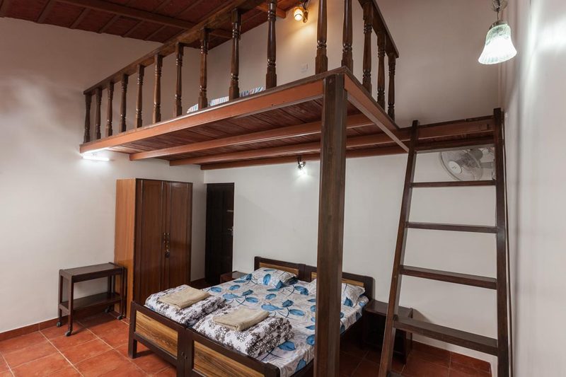 Main house bedroom with mezzanine sleeping area