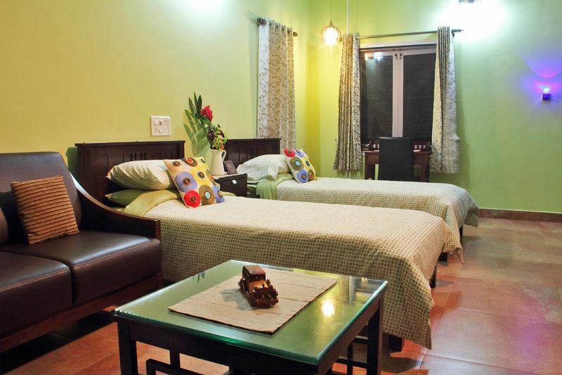 Well furnished room with twin beds