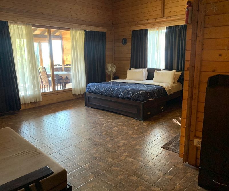 Comfortable bedroom in a mountain homestay in Chikmagalur