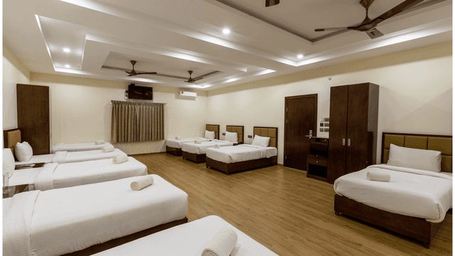 Comfortable 900 sq. ft. Group Room in Chikkamagaluru designed for up to 11 guests with modern comforts
