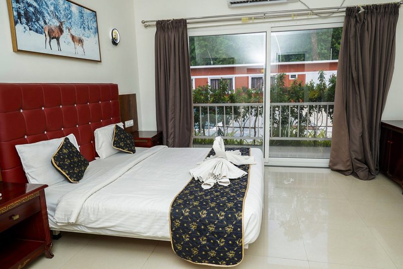 AC Executive Room interior at Ashoka Jungle River Resort Dandeli